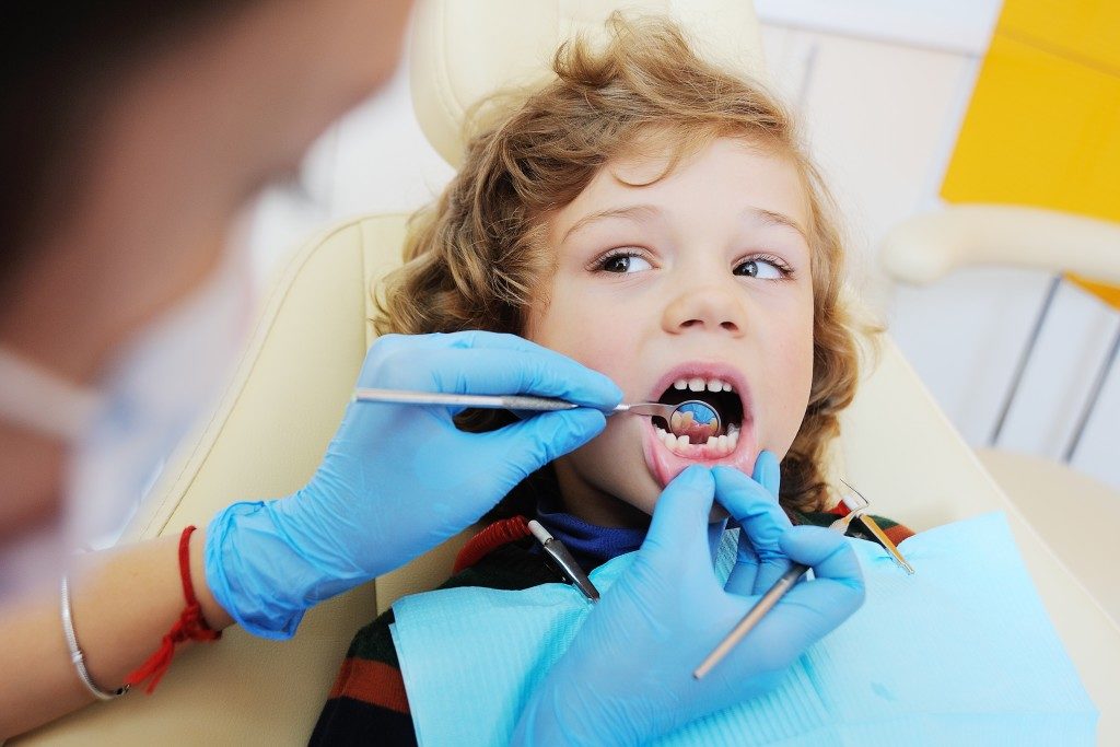 child in dental clinic